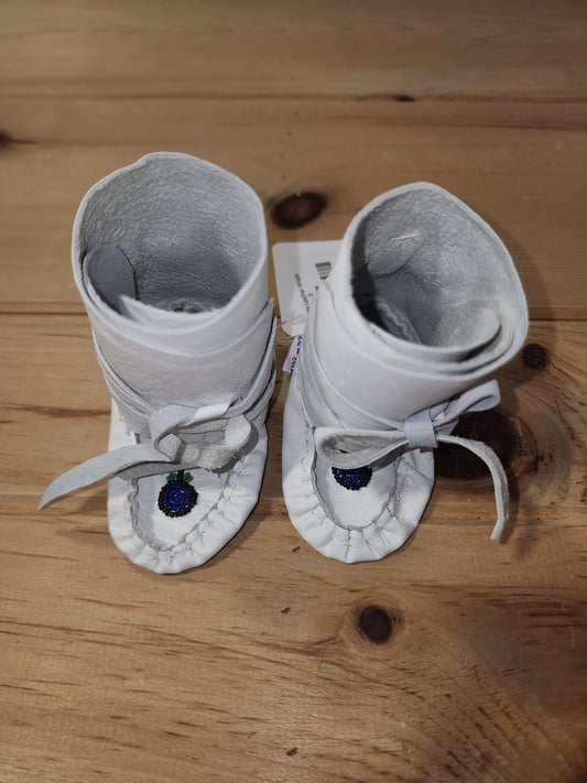 Chaussons en cuir blanc taille 0